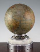 A Jaeger Le Coultre electric revolving globe timepiece, surmounted with a J.Forest Terrestrial globe