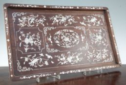 A Chinese rosewood and mother of pearl inlaid rectangular tray, late 19th century, decorated with