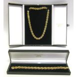 AN 18 CARAT GOLD BRACELET & NECKLACE SET with London import marks, of fancy knotted links,