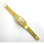 BULOVA, ACCUTRON, A GENTLEMAN'S 18 CARAT GOLD BRACELET WATCH London import marks 1978, the