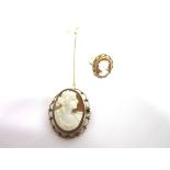 A 9CT GOLD SHELL CAMEO BROOCH Birmingham 1914, the oval shell to a wire and bead frame, 3.4cm