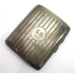 A SILVER CIGARETTE CASE by Walker & Hall, Sheffield 1915, with linear engine turned decoration,