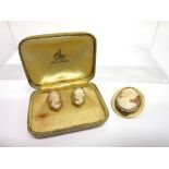 A SHELL CAMEO BROOCH stamped '9ct'; with a pair of shell cameo earstuds, cased