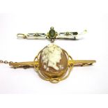 A SHELL CAMEO BAR BROOCH stamped '9c', 5.1cm long, 5.8g gross; with a peridot and seed pearl brooch,