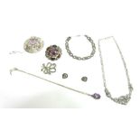 A SILVER SCOTTISH AMETHYST BROOCH Edinburgh 1962; with a Scottish pebble brooch; a marcasite set