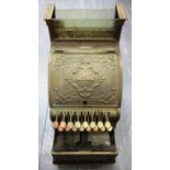A NATIONAL CASH REGISTER serial number 1538940/314, with an ornate cast brass body, 43.5cm high (