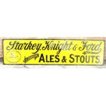 A STARKEY, KNIGHT & FORD ALES & STOUTS ENAMEL WALL SIGN by Chromo of Wolverhampton, with black