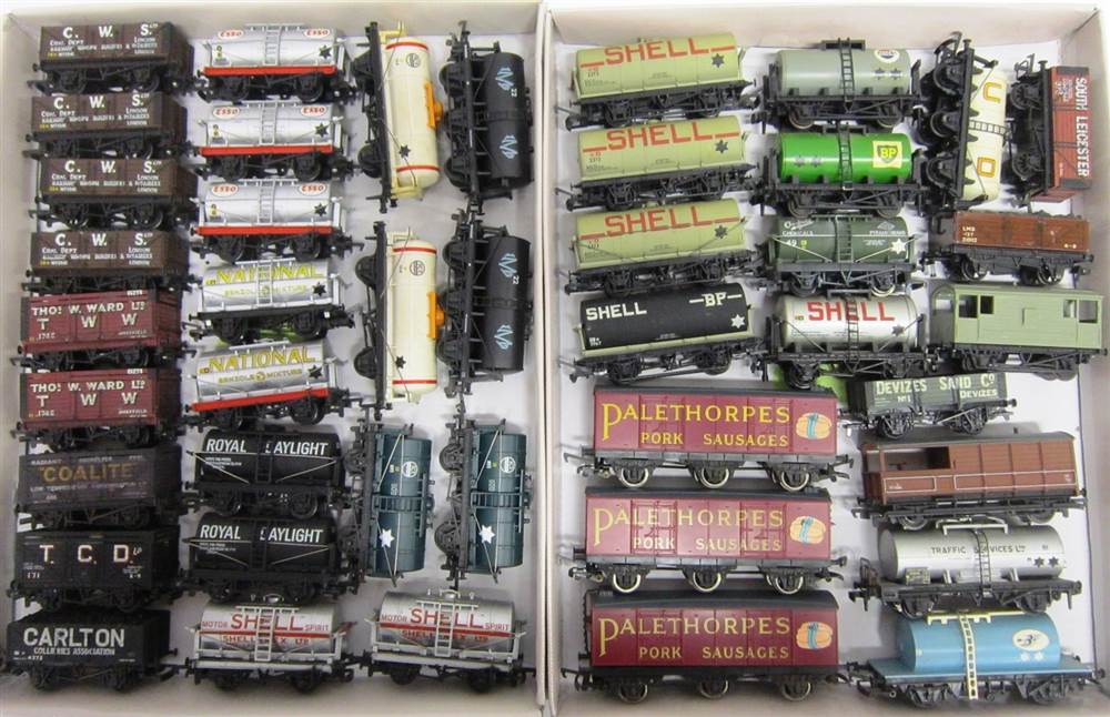 [OO GAUGE]. FORTY-THREE ASSORTED WAGONS by Mainline, Hornby Dublo and others, including petrol
