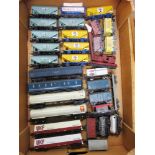 [OO GAUGE]. THIRTY-ONE ASSORTED WAGONS by Lima, Wrenn and others, including grain wagons, all