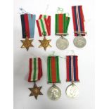A SECOND WORLD WAR GROUP OF FOUR MEDALS comprising the 1939-45 Star, Italy Star, Defence Medal,