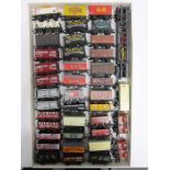 [OO GAUGE]. FORTY-ONE ASSORTED WAGONS by Wrenn, Mainline and others, all unboxed.