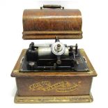 AN EDISON STANDARD PHONOGRAPH serial number S120722, complete with transfer printed wooden cover;