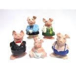 A SET OF FIVE WADE POTTERY 'NAT WEST' PIGGY BANKS comprising Sir Nathaniel Westminster, Lady