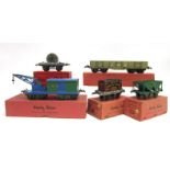 [O GAUGE]. FIVE HORNBY WAGONS comprising a No.2 L.M.S. High Capacity Wagon; L.M.S. Breakdown Van and