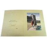 [ROYAL MEMORABILIA]. QUEEN ELIZABETH II (B.1926) A Christmas card, with a mounted colour portrait