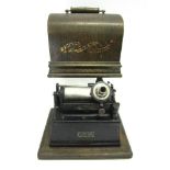 AN EDISON GEM PHONOGRAPH serial number G94081, complete with transfer printed wooden cover.