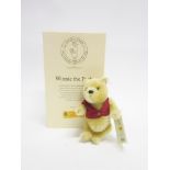 A STEIFF 'WINNIE THE POOH' COLLECTOR'S BEAR 2001, limited edition no.1631, 18cm high, boxed.