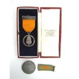 A BOY SCOUT MOVEMENT SILVER ACORN MEDAL by Collins of London, in case of issue; together with a