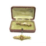 A LATE VICTORIAN 9CT GOLD BROOCH Birmingham 1896, set with a rose cut diamond, 4.1cm long; with a