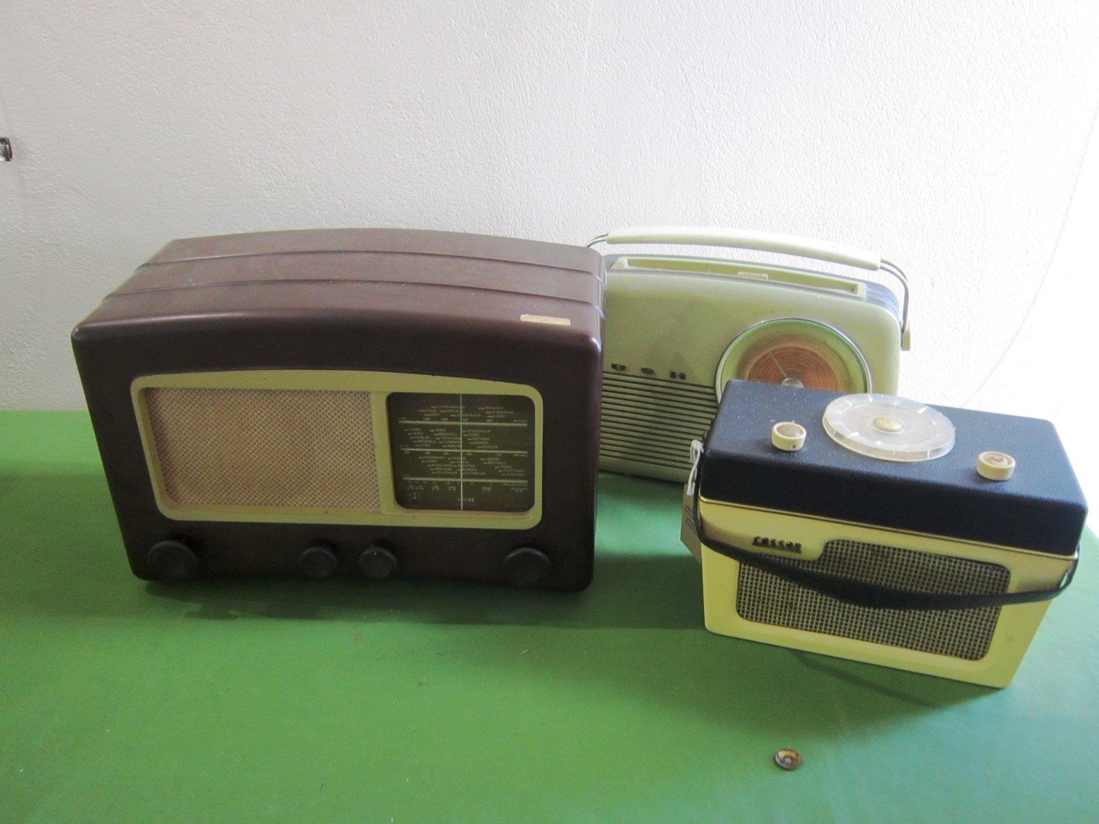 A COSSOR 'MELODY MAKER' BROWN BAKELITE RADIO circa late 1940s; together with a Cossor portable