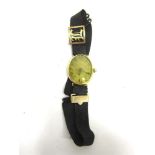 ANONYMOUS, A LADY'S GOLD WRISTWATCH with continental control marks, circa 1920, the oval dial with