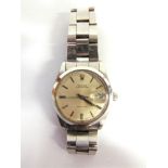 ROLEX, OYSTERDATE PRECISION a gentleman's stainless steal bracelet watch, the white dial with