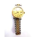 ROLEX, OYSTER PERPETUAL DATEJUST a gentleman's two colour bracelet watch, the yellow dial with