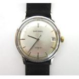 GARRARDS, A GENTLEMANS STAINLESS STEEL WRIST WATCH the signed circular dial with steel batons, hands