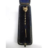 A FOX MASK STICKPIN unmarked, 1.4g gross, cased