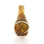 ROLEX, PRECISION a lady's 9 carat gold bracelet watch, the gilt oval dial with gilt black batons,