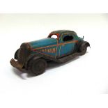 A BRITISH TINPLATE SPORTS COUPE circa 1940s, blue with white and orange lining, fitted with a