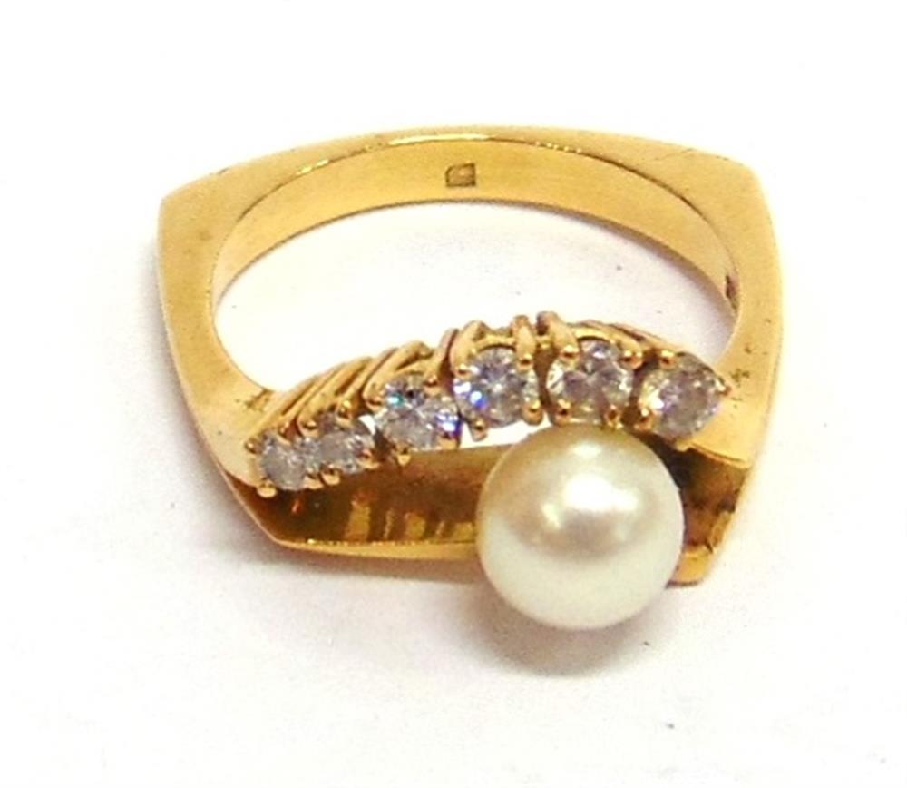 A CUTLURED PEARL AND DIAMOND CONTINENTAL DRESS RING  the 6mm diameter pearl with a line of six