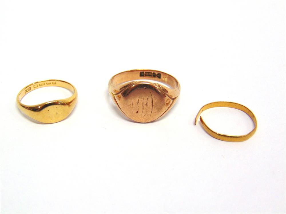 A 9CT GOLD SIGNET RING 6.5g gross; with an 18ct gold signet ring, 4g gross; and a 22ct gold