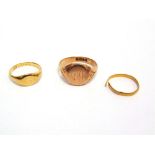 A 9CT GOLD SIGNET RING 6.5g gross; with an 18ct gold signet ring, 4g gross; and a 22ct gold
