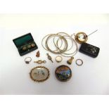 A SMALL QUANTITY OF JEWELLERY including eight bangles; three rings; two watch fobs; two watch