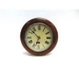AN EDWARDIAN WALL CLOCK 30 hour movement, the painted dial with Roman numerals, 27.5cm diameter