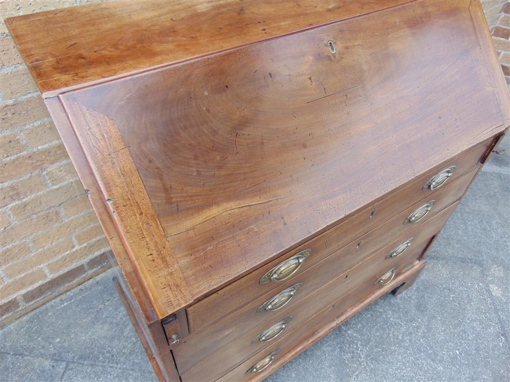 A GEORGE III MAHOGANY BUREAU with fitted interior, four graduated drawers on bracket feet, 102cm - Image 3 of 3