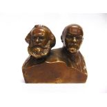 A PATINATED METAL BUST depicting Marx and Lenin, with impressed Cyrillic signature, dated 1968 to