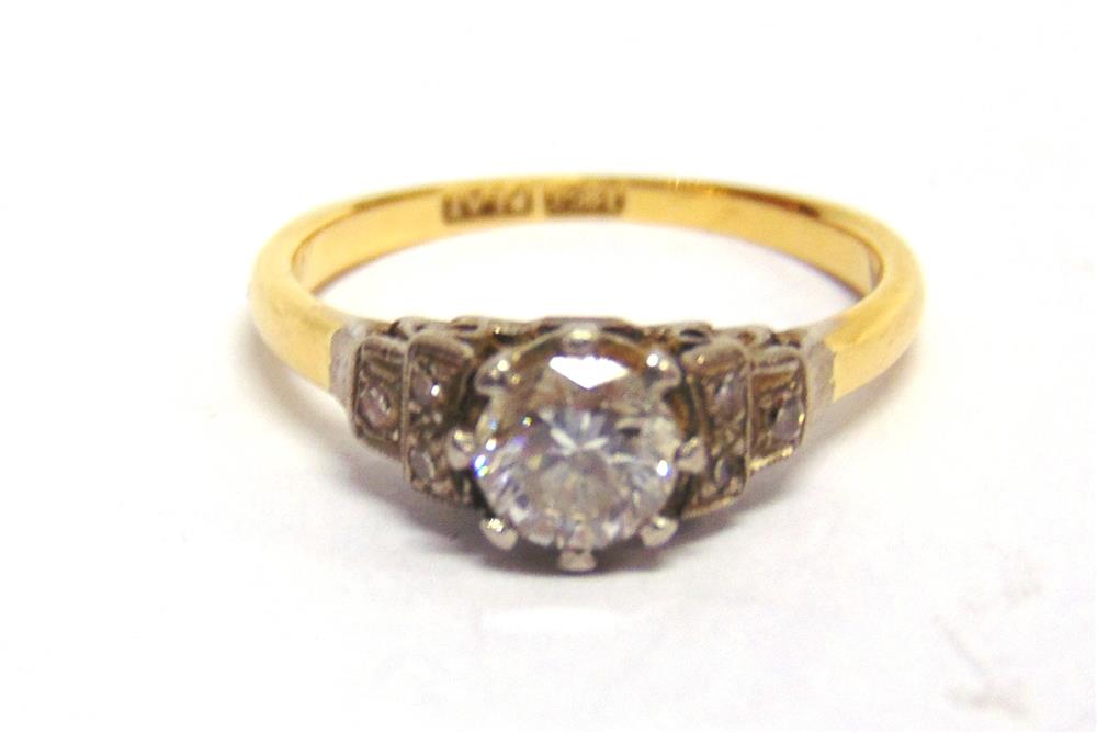 A DIAMOND SINGLE STONE RING  the brilliant cut approximately 0.53cts calculated, between stepped