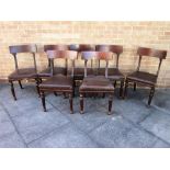 A MATCHED SET OF SEVEN (5 + 2) WILLIAM IV/EARLY VICTORIAN DINING CHAIRS, figured mahogany back rails