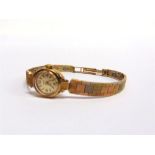 SMITHS, A LADY'S 9CT THREE COLOUR GOLD MECHANICAL BRACELET WATCH 17.5g excluding movement,