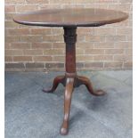 A MAHOGANY TILT TOP TRIPOD TABLE the circular top 71.5cm diameter, 72.5cm high