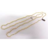 A TWO ROW GRADUATED CULTURED PEARL NECKLACE the 100/92 pearls of approximately 3mm to 6mm