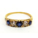 A SAPPHIRE AND DIAMOND FIVE STONE RING partial '18ct' stamp, the two old cut diamonds totalling