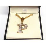 AN INITIAL P 9 CARAT GOLD CUBIC ZIRCONIA PENDANT on a 9 carat gold micro belcher chain, 4.6g gross