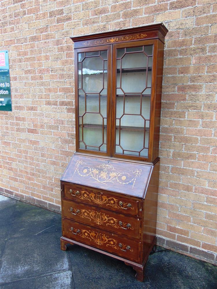 AN EDWARDIAN MAHOGANY BUREAU BOOKCASE,  with astragal glazed upper section and fitted interior