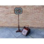 A MAHOGANY POLE SCREEN,  with floral tapestry panel, on tripod base 142cm high, together with a