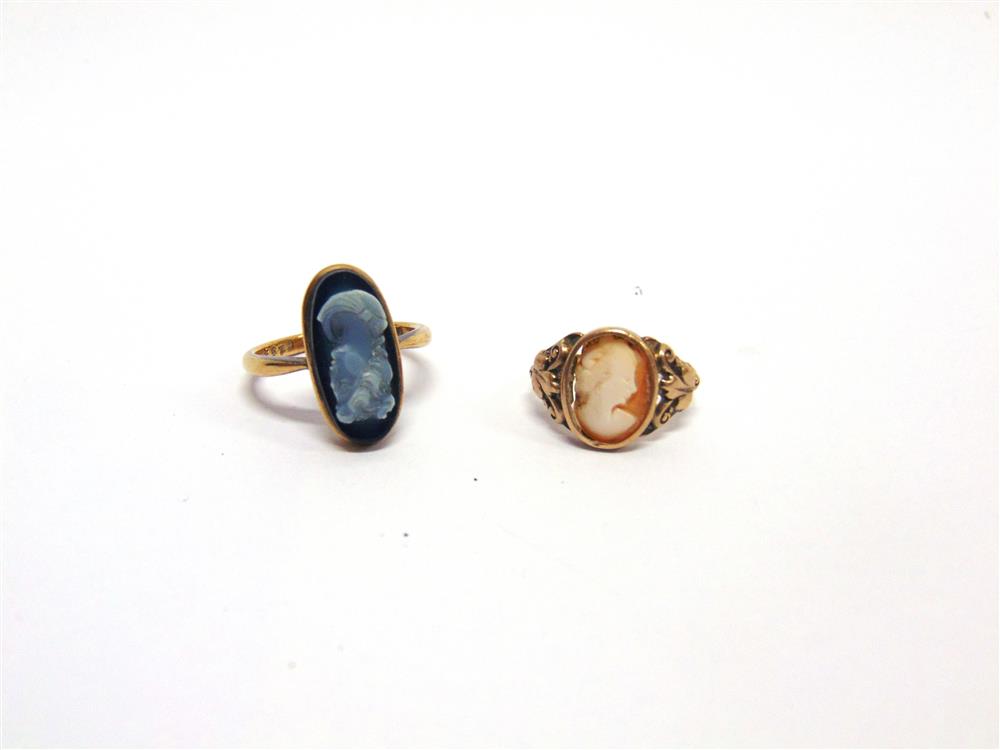 A HARDSTONE CAMEO RING  stamped '9ct', carved as a female in profile, finger size O; and a shell