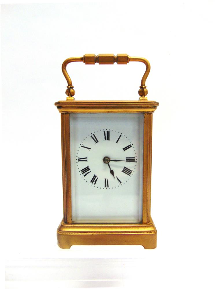 A FRENCH BRASS CASE CARRIAGE CLOCK, striking hour and half hour, the white enamelled dial with Roman