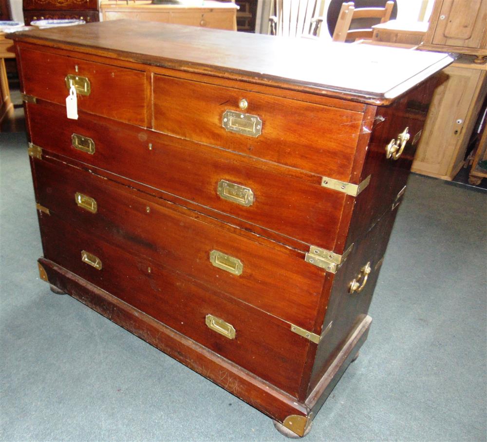 A 19TH CENTURY BRASS MOUNTED CAMPAIGN CHEST  of two short and three long drawers, the two part chest